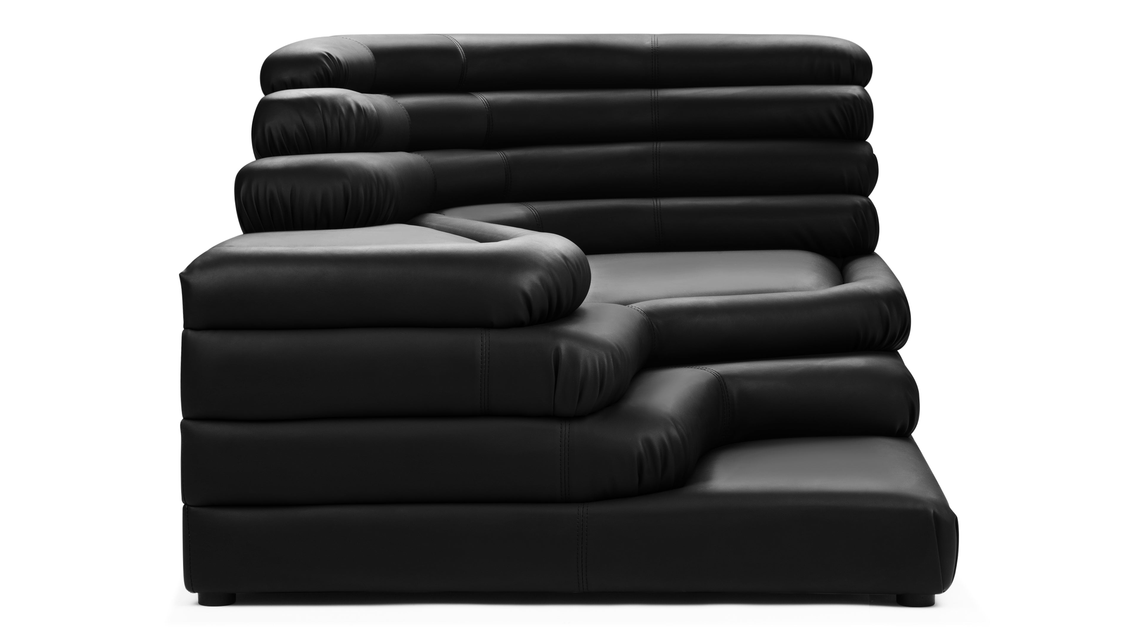 Luxurious living room featuring the sleek Terrazza Sofa in black vegan leather.