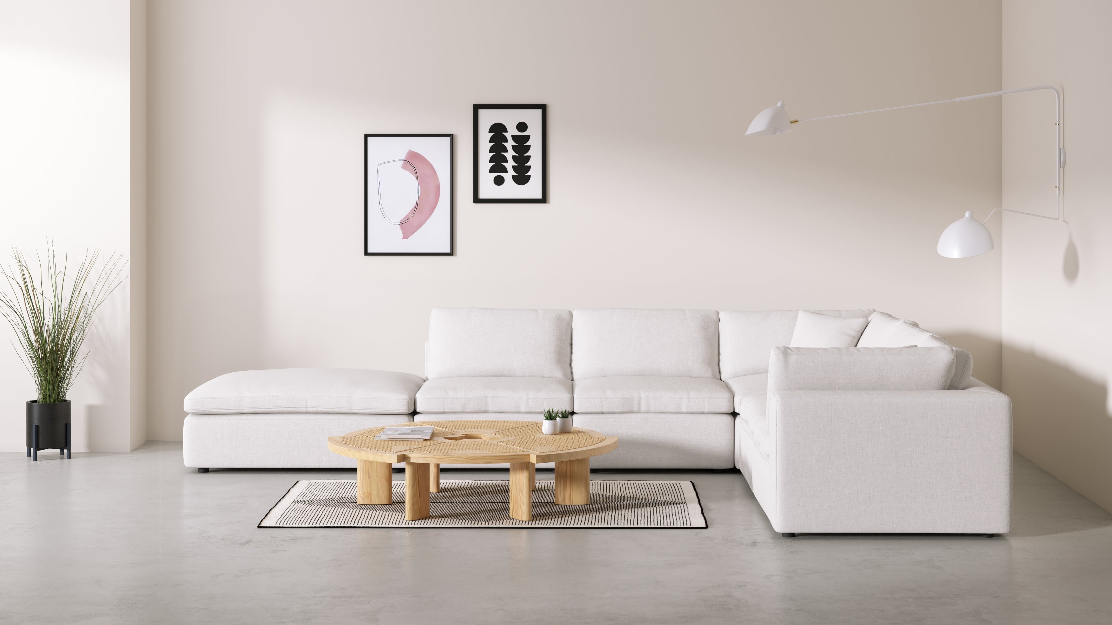 Cloud modular sofa draped in white linen, blending comfort and elegance.