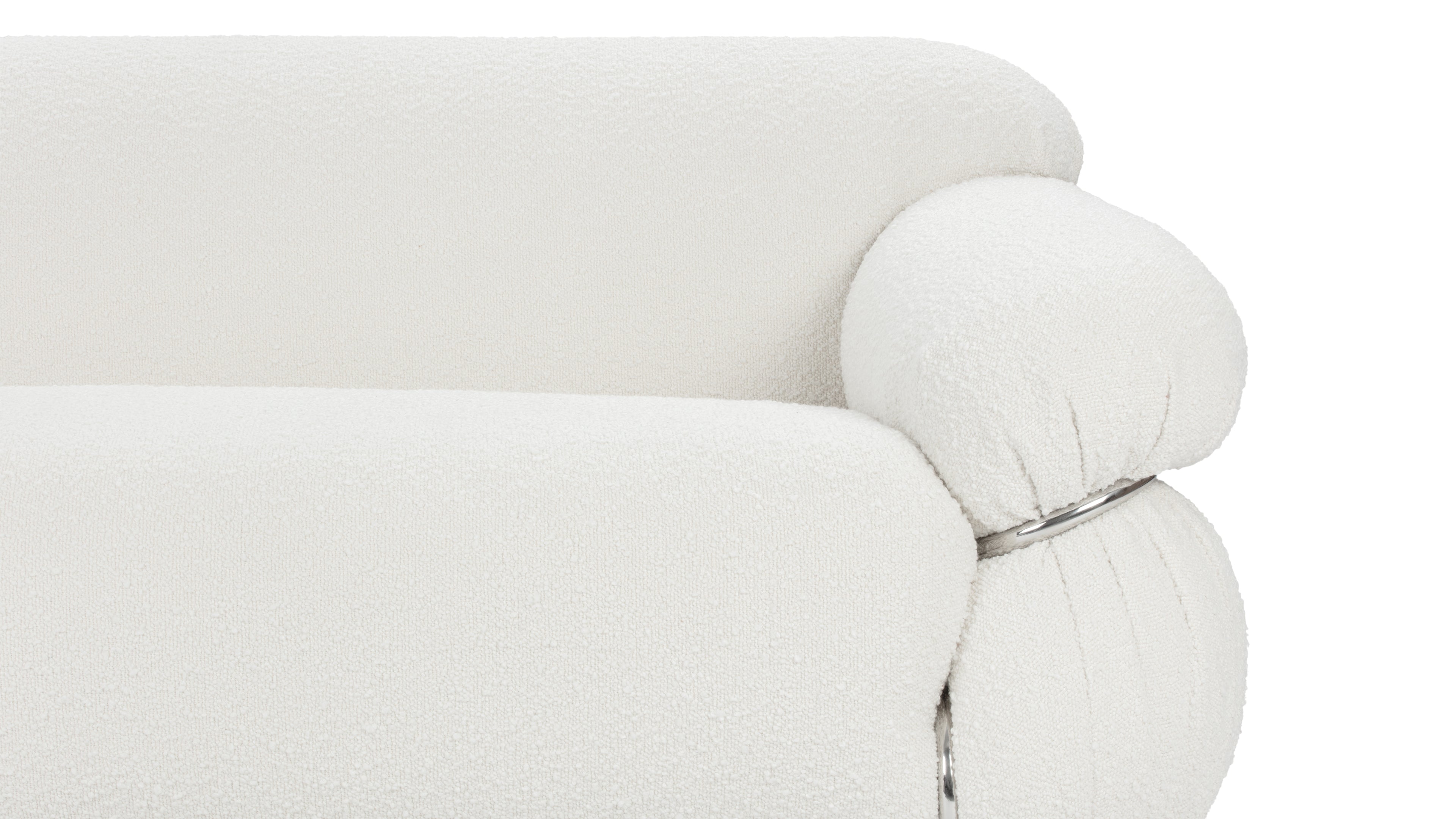 Timeless elegance of the Sesann Two-Seater Sofa with deep foam cushions in luxurious white boucle