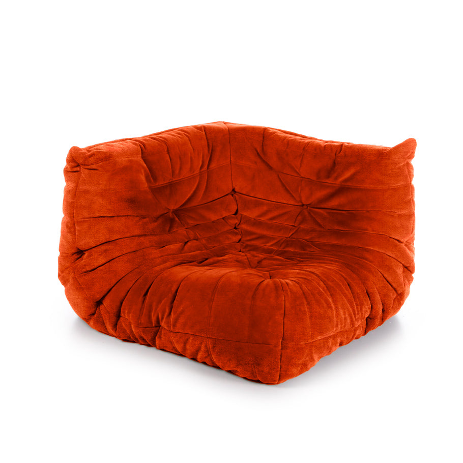 Customizable Togo corner seat in a vibrant living space.