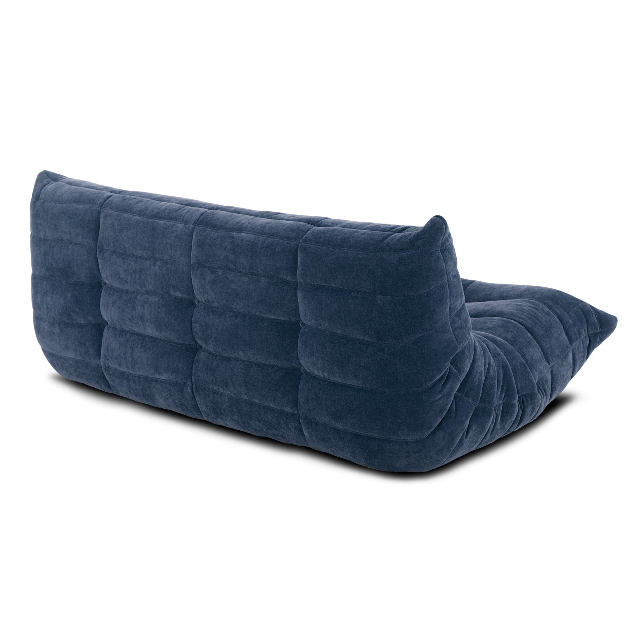 Sleek modern leather sectional, Togo 3-seater, for minimalist interiors.