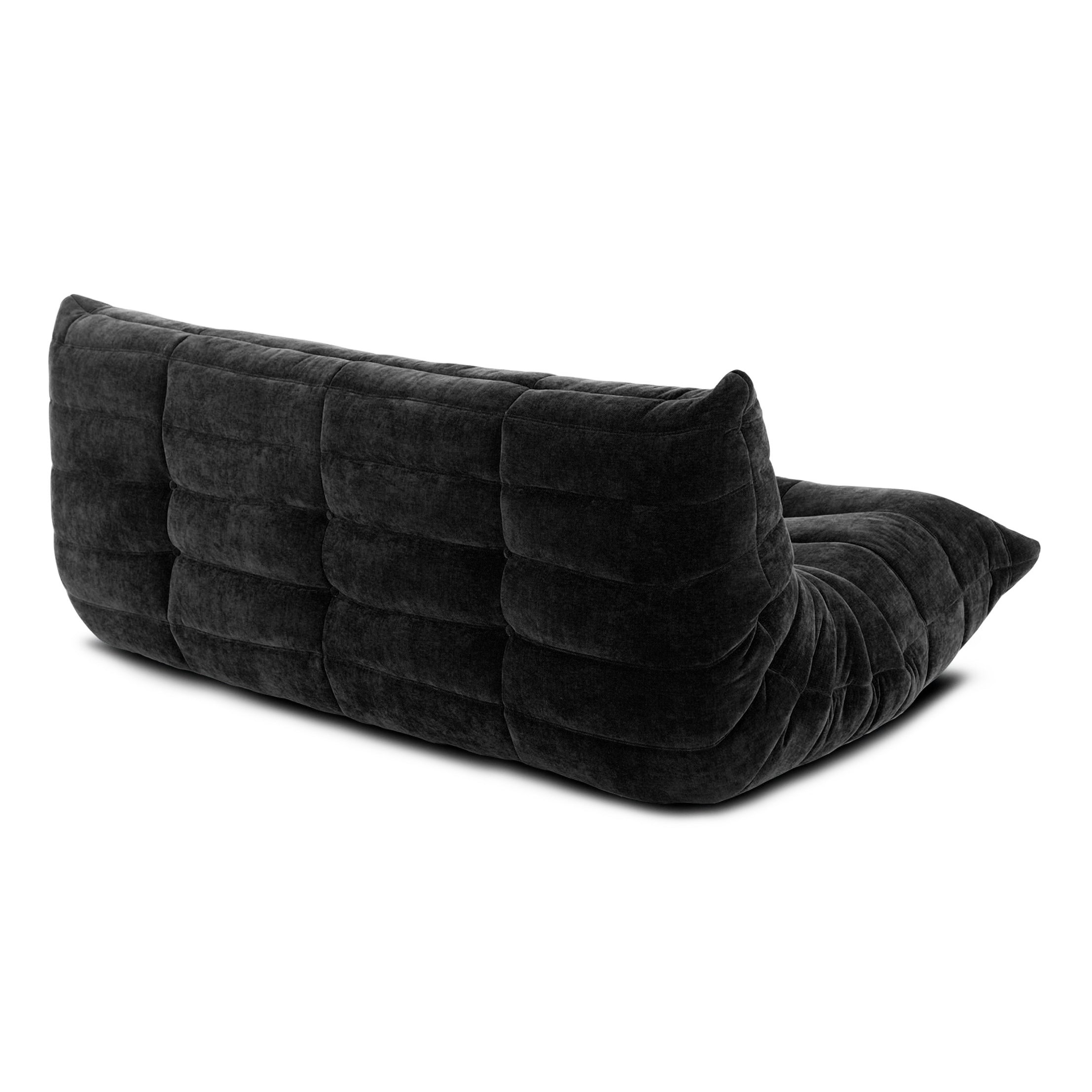 Curved couch design in Togo's signature 3-seater, a modern touch.