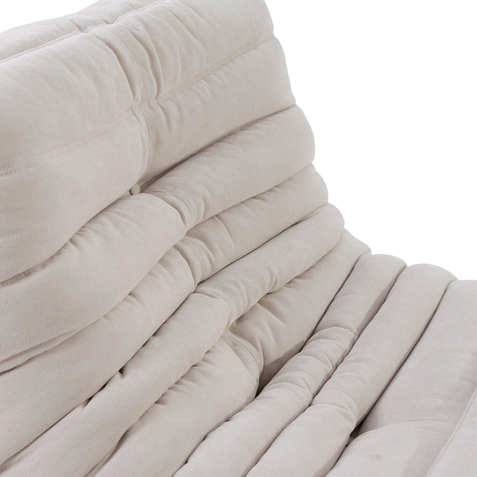 Trendy Togo couch in contemporary sectional style, ideal for modern living arrangements.
