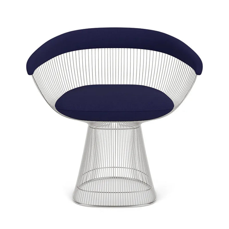Elegant Warren Platner armchair, blending mid-century modern design with luxurious comfort.