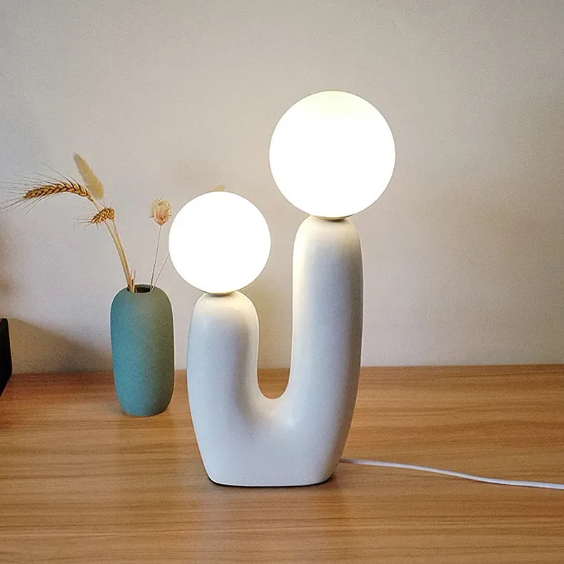 Art Deco-inspired table lamp for bedroom elegance
