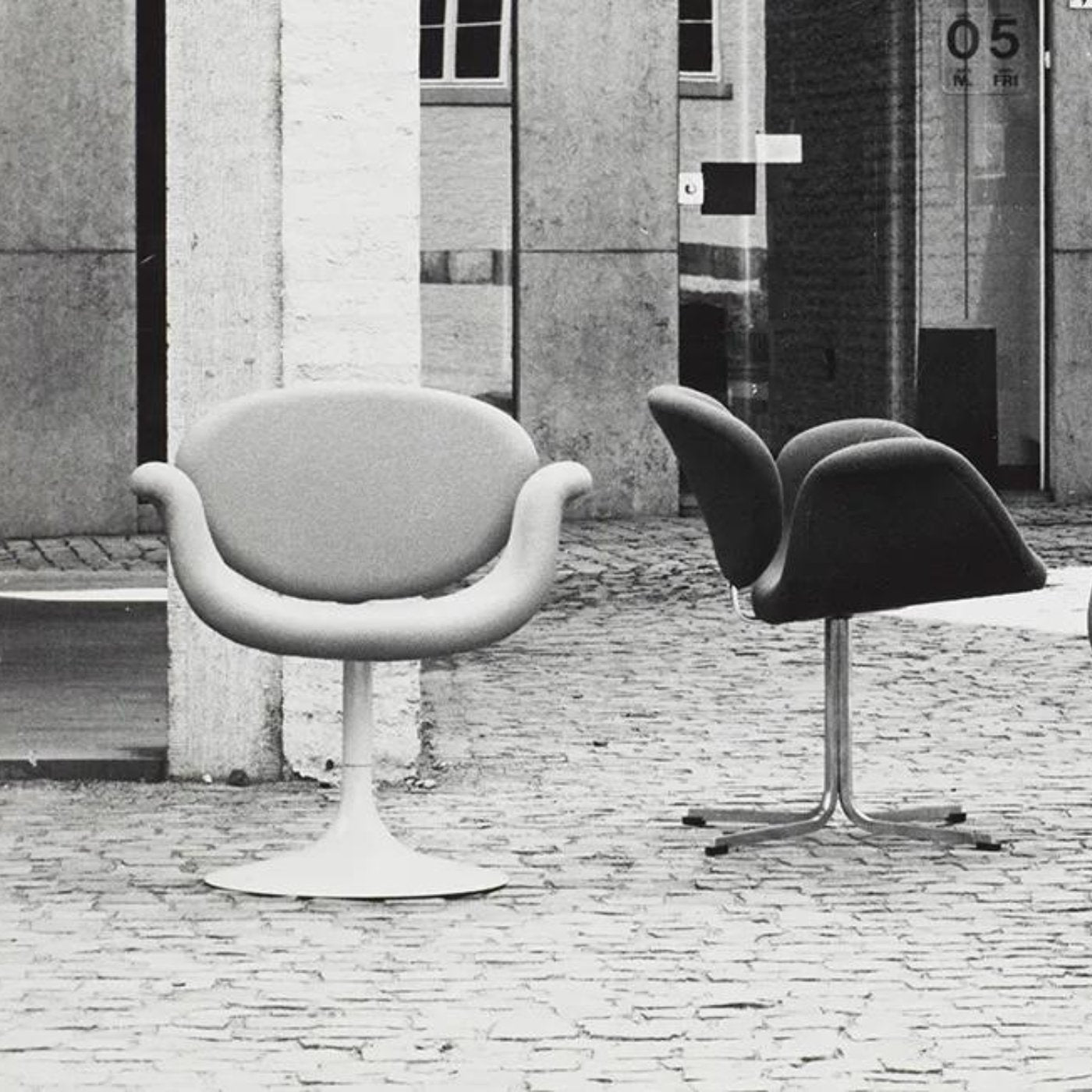 Elegant Little Tulip Chair by Pierre Paulin, offering a warm and inviting embrace.