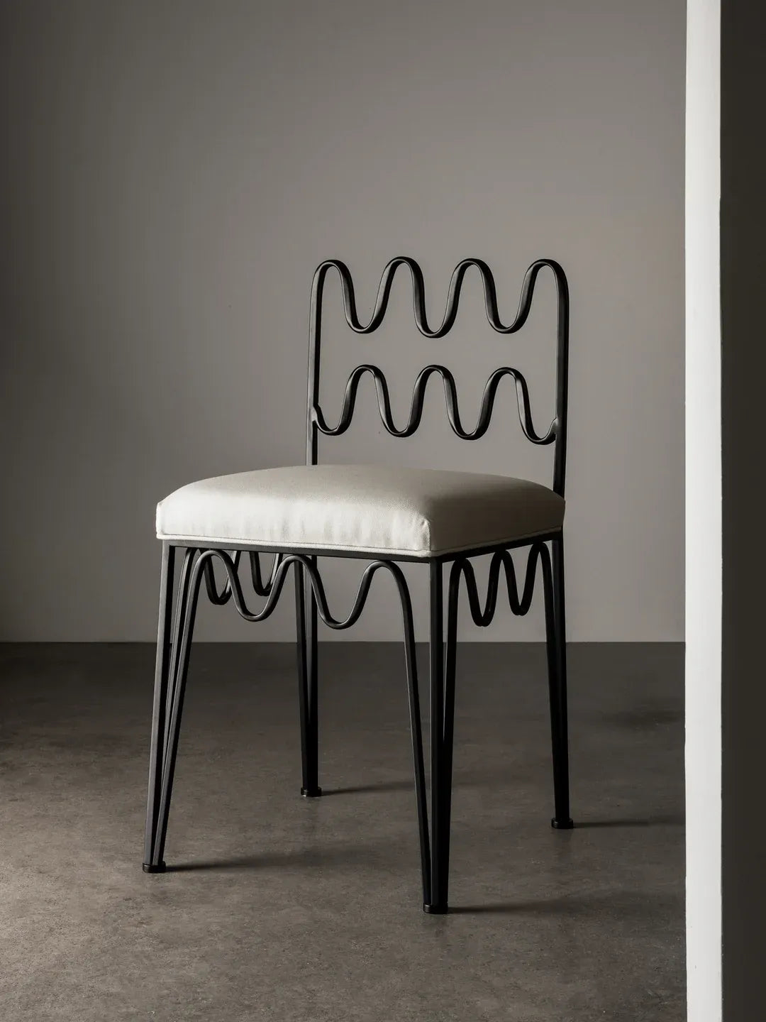 Comfortable Wave Chair Ivory, combining stylish design with practical seating.