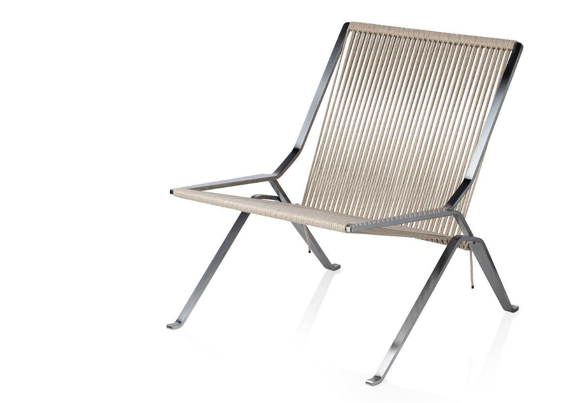 Comfortable PK25 reading chair, ideal for long reading sessions in any setting.