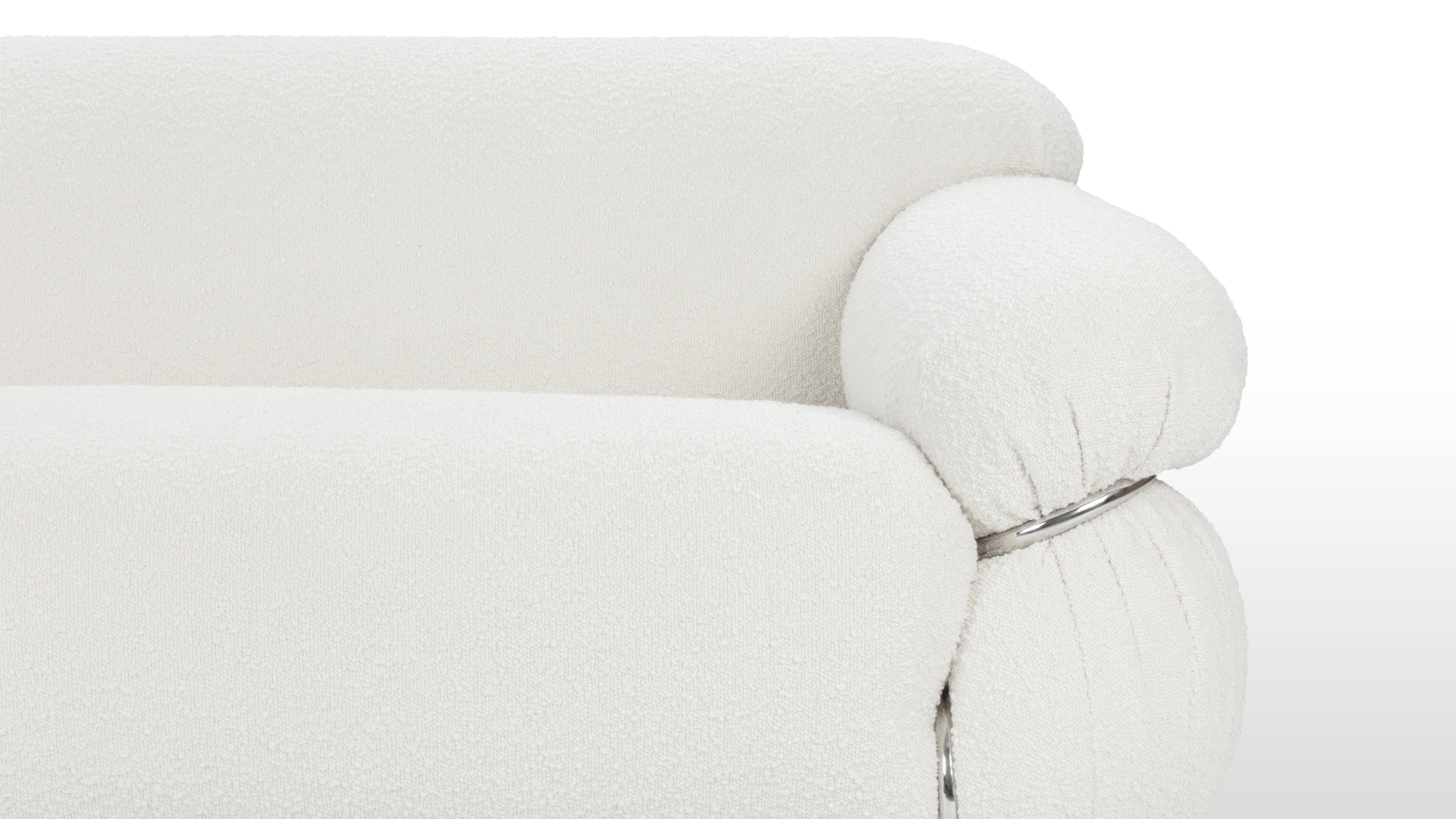 White Boucle Sesann Sofa with solid wood frame and stainless steel base for durability.