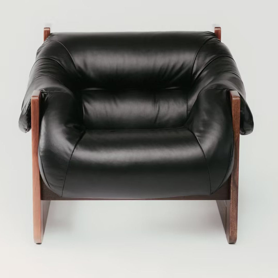 black-leather-upholstery-mid-century-armchair
