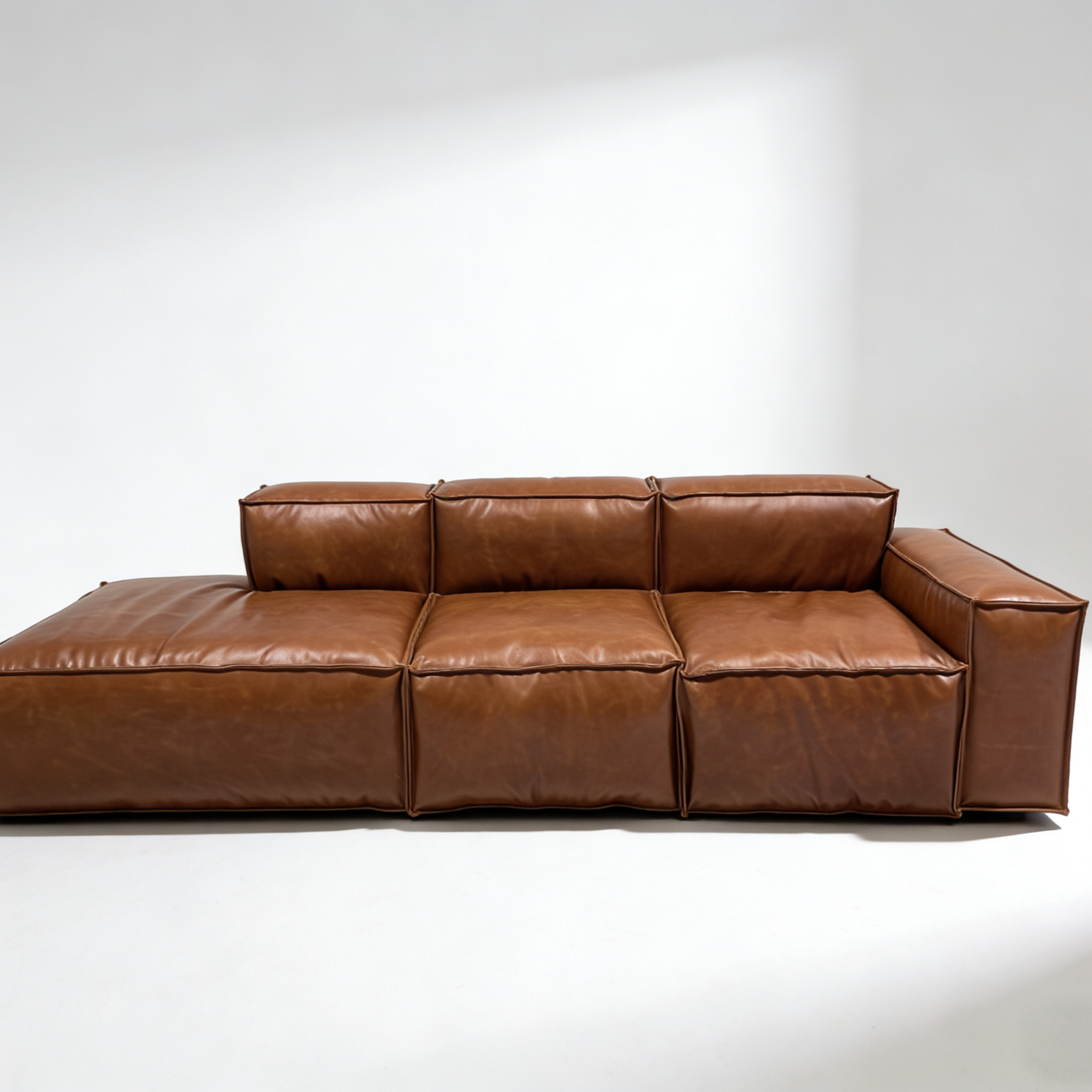 - elephant-ear-brown-leather-modular-sectional-sofa-front-view