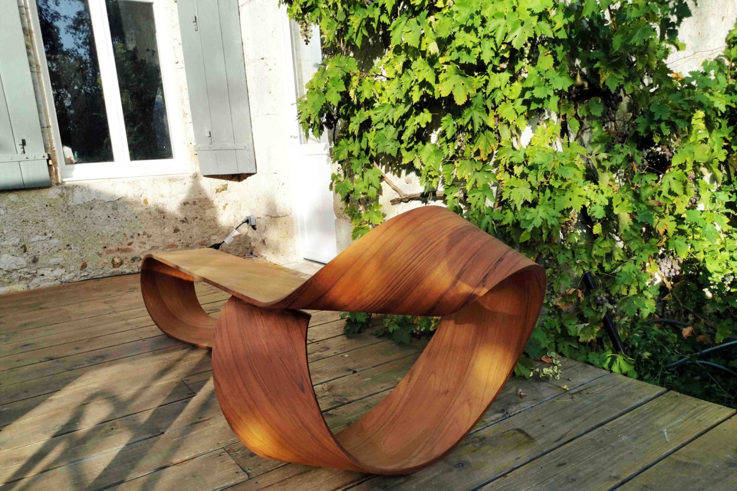 Mobius Teak Bench: Timeless Elegance for Your Outdoor Space