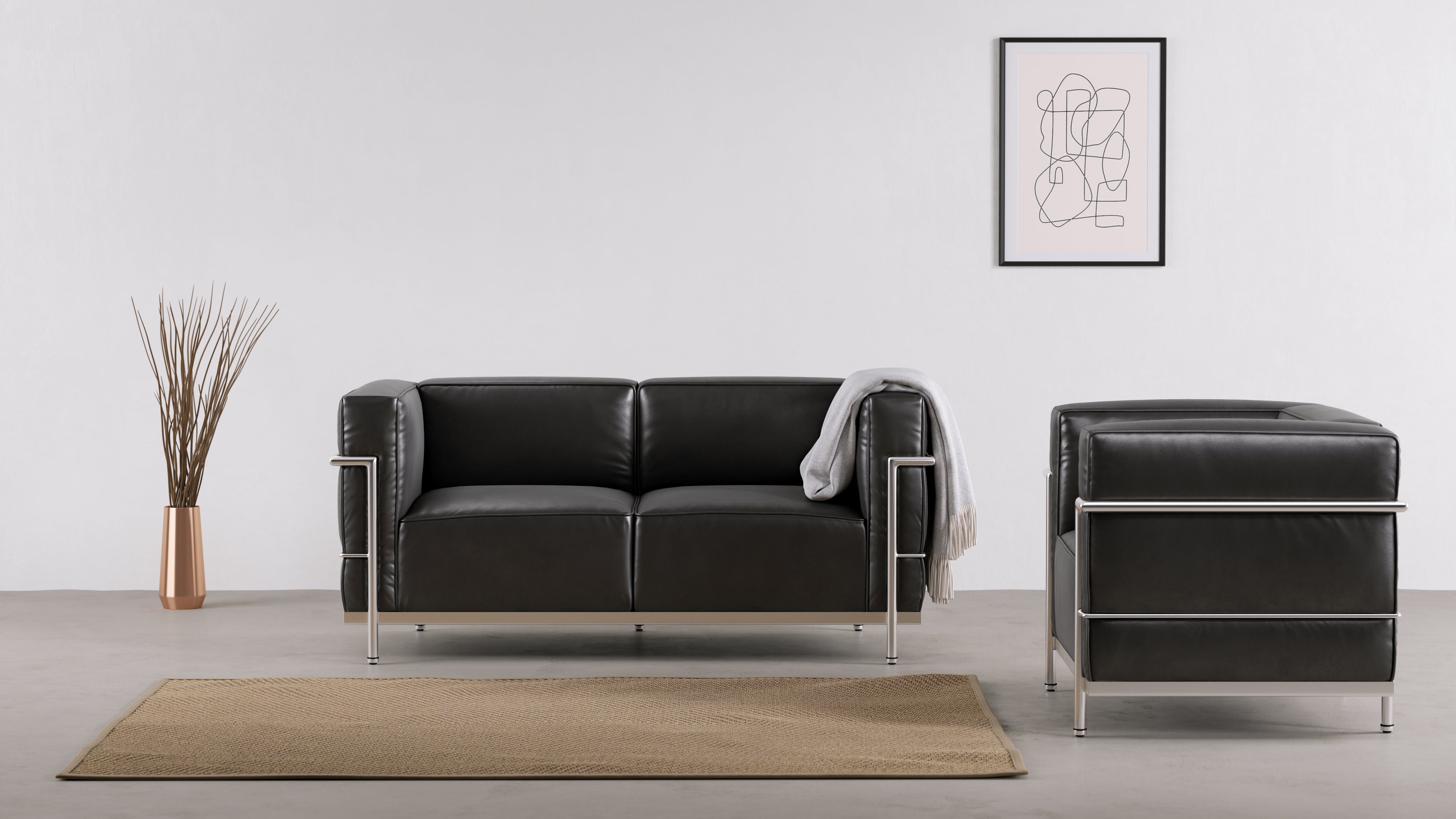 Architectural beauty and supreme comfort in the LE Corbusier Grand Modele two-seater sofa.