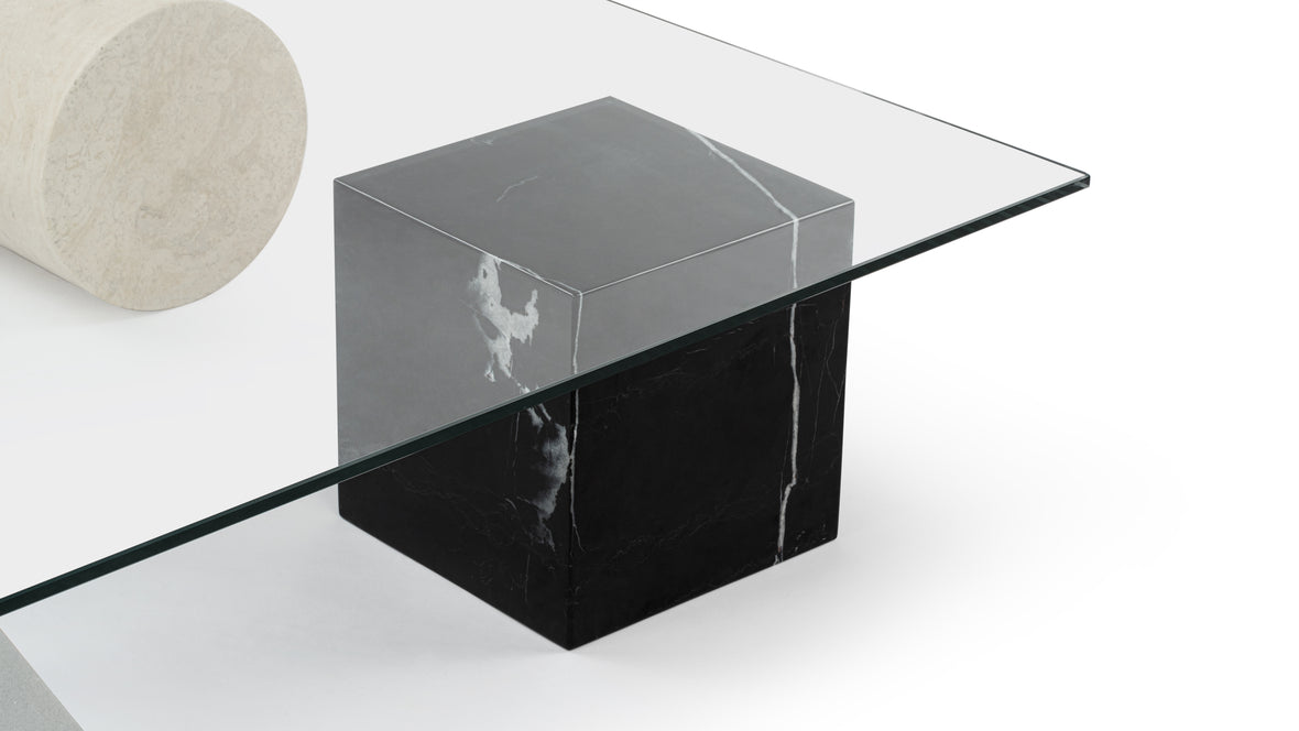 Custom Solange coffee table with glass top, tailored to reflect upscale living standards.