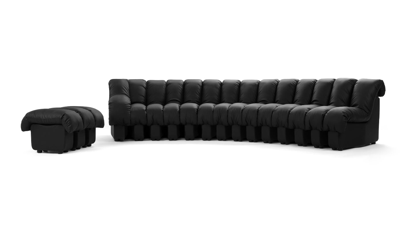 Detail view of the premium leather upholstery on Le Corbusier Grand Modele three seater sofa.