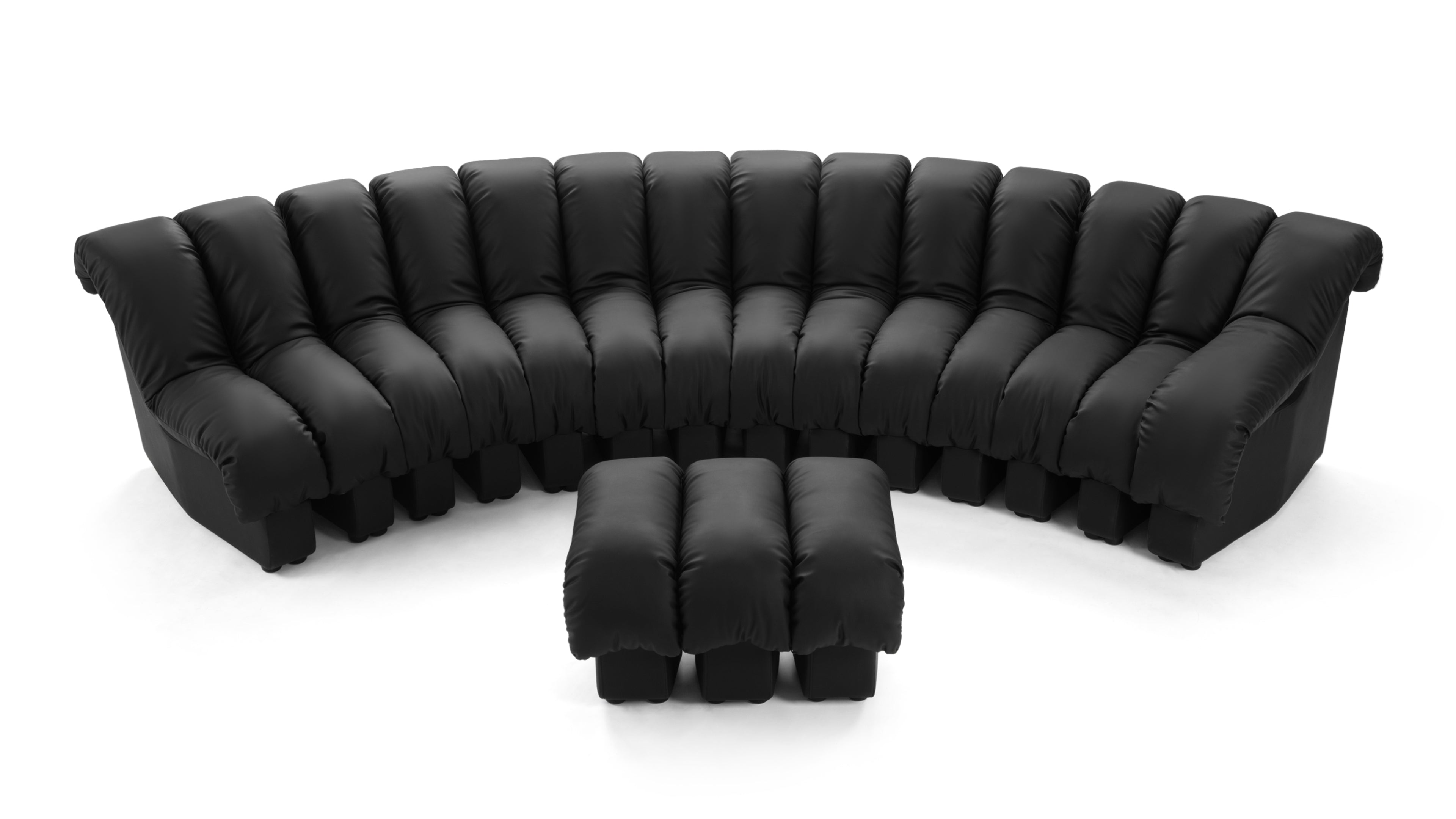 Detail view of the premium leather upholstery on Le Corbusier Grand Modele three seater sofa.