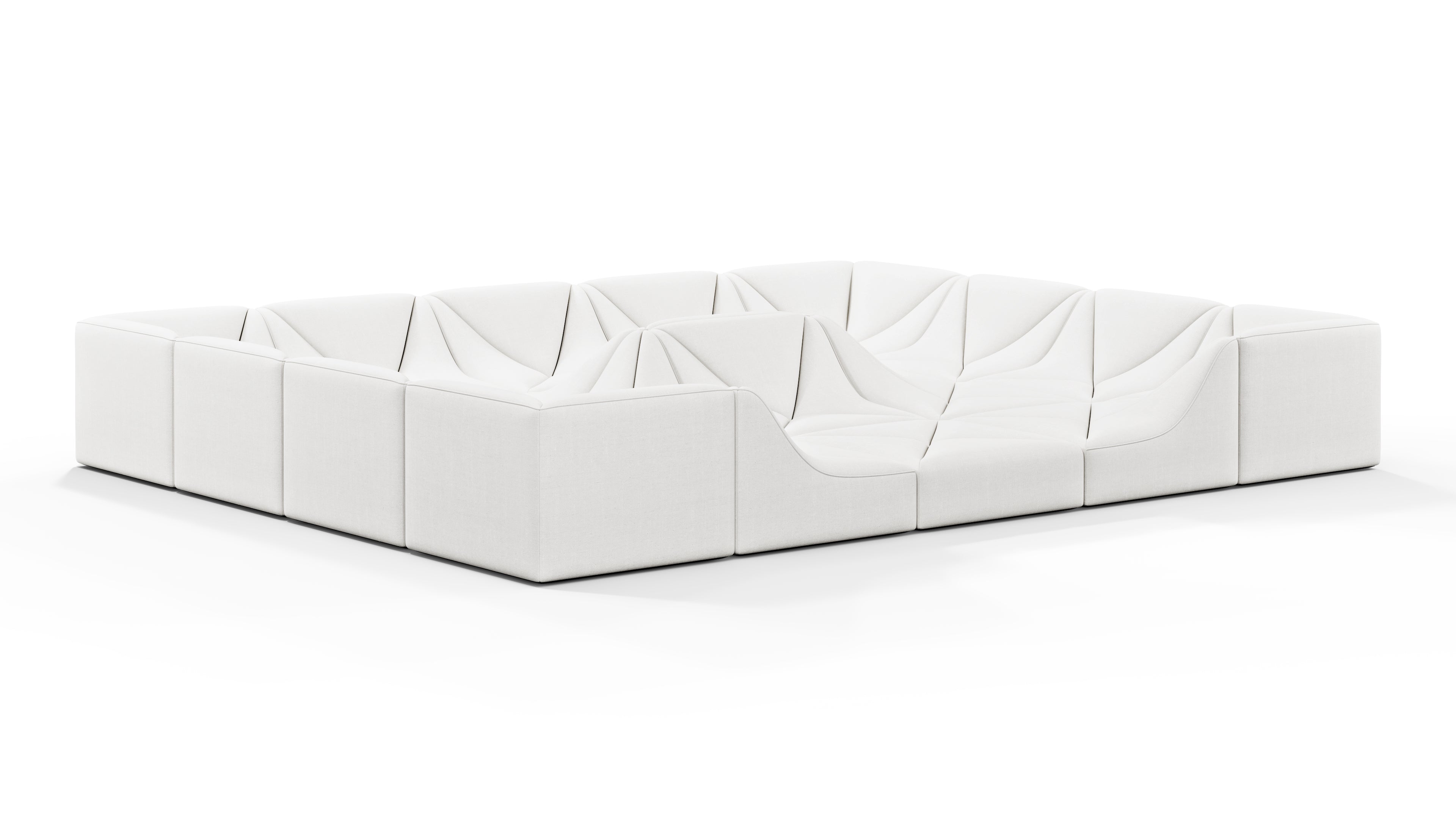 Elegant Dune modular sofa with deep foam-wrapped cushions in a spacious office environment.