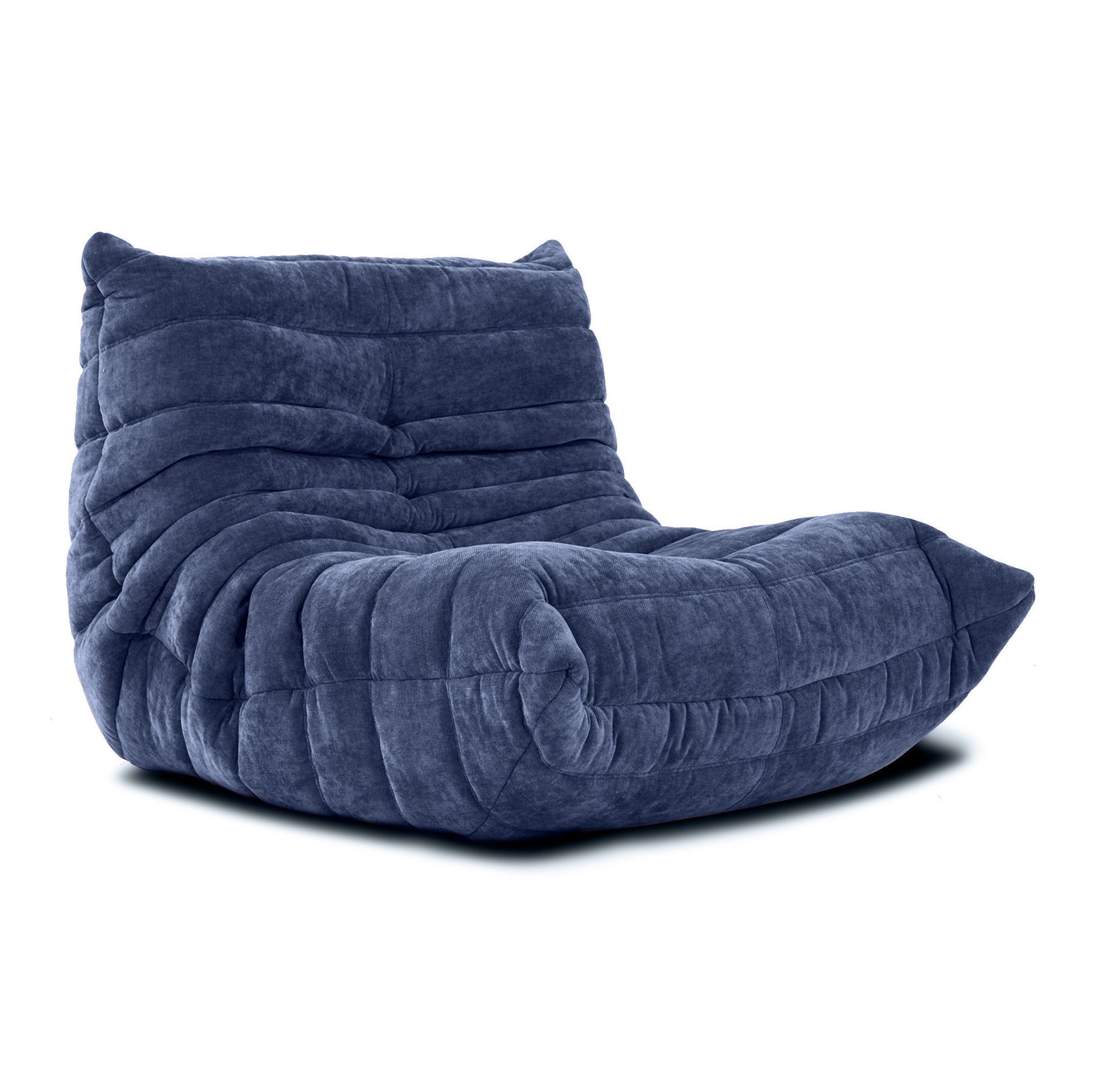 Plush Togo Sofa Fireside Chair, embodying comfort with its multi-density foam construction for ultimate relaxation.