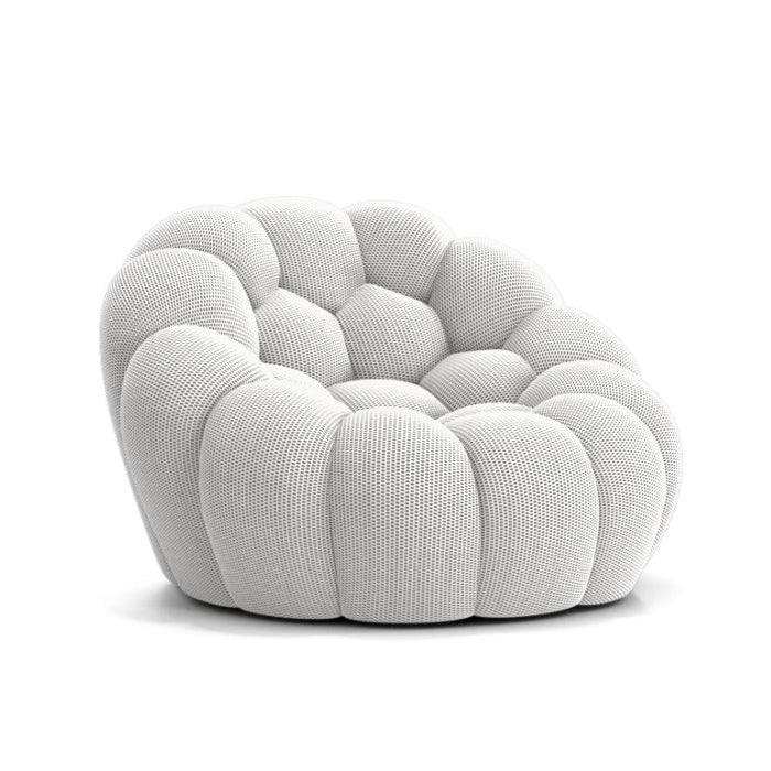 Elegant curved couch by Pierre Paulin, enhancing living room decor with its sculptural form.