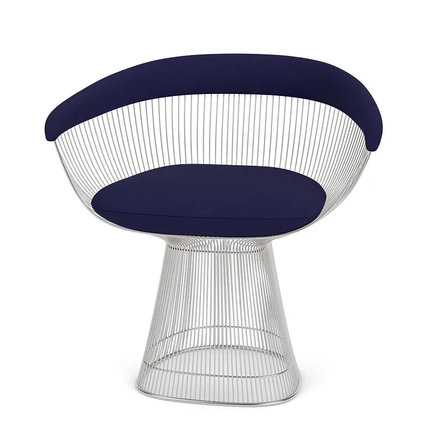 Stylish Warren Platner chair, featuring iconic wire base and cushioned seating.