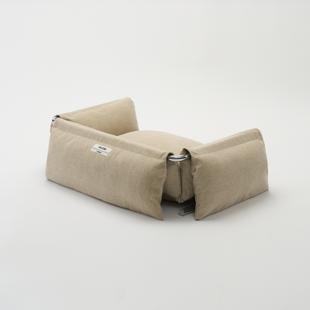 premium-beige-textured-fabric-lying-bed
