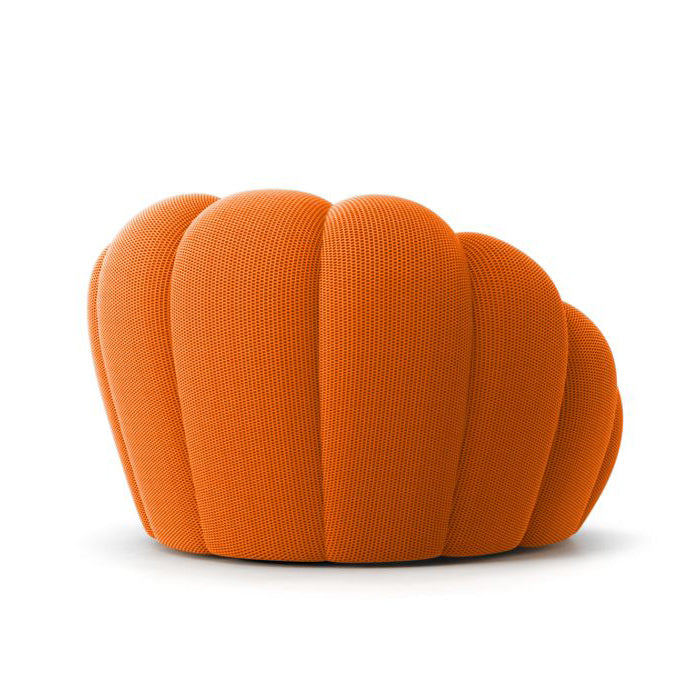 Stylish sofa for bedroom by Pierre Paulin, merging comfort with modern sculpture.