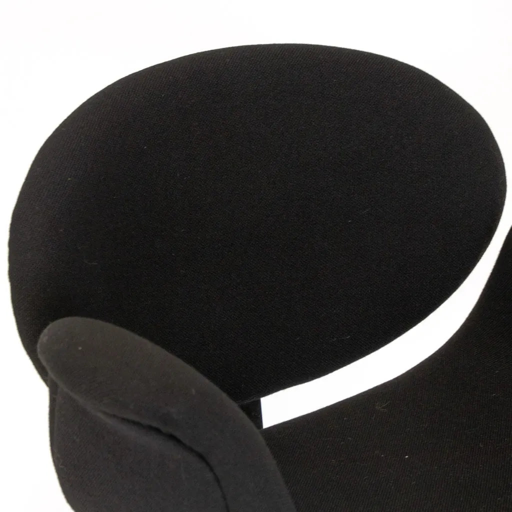 Sophisticated Little Tulip Chair with armrests.