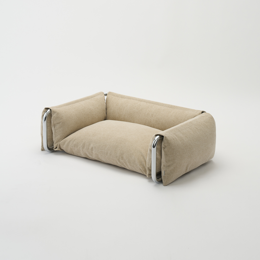 compact-cozy-milliong-lying-bed-side-view
