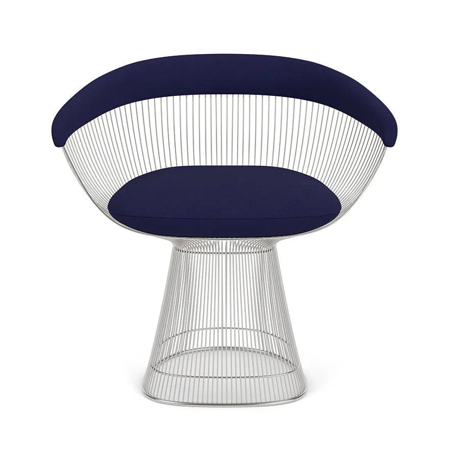 Elegant Warren Platner armchair, blending mid-century modern design with luxurious comfort.