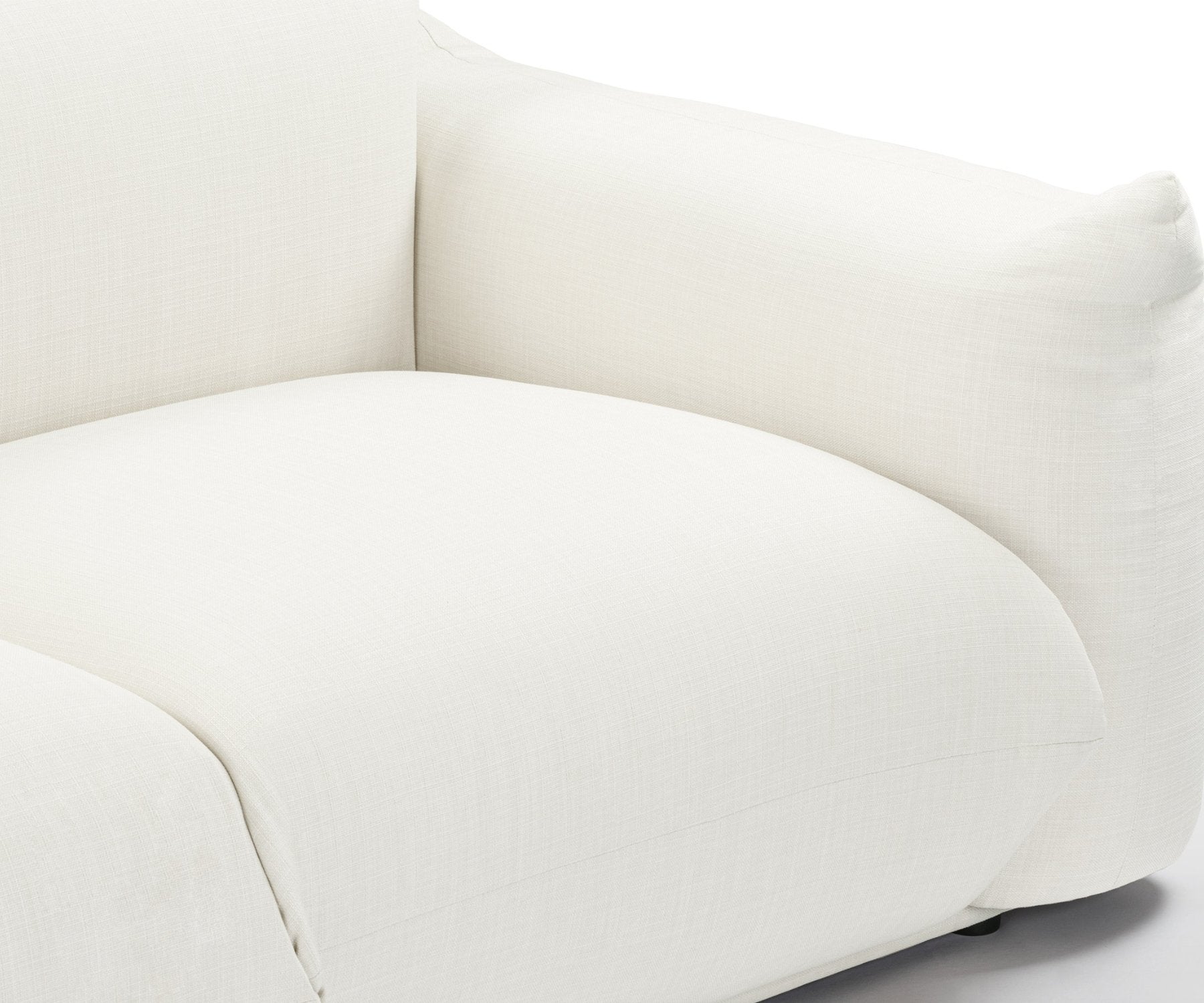 Refined Marenco Sofa in ivory linen, enhancing the beauty of minimalist decor.