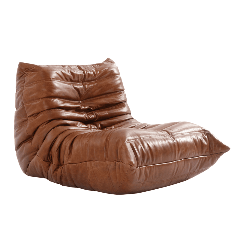 Luxurious Michel Ducaroy Togo Leather Fireside Chair, a blend of heritage and modern comfort.