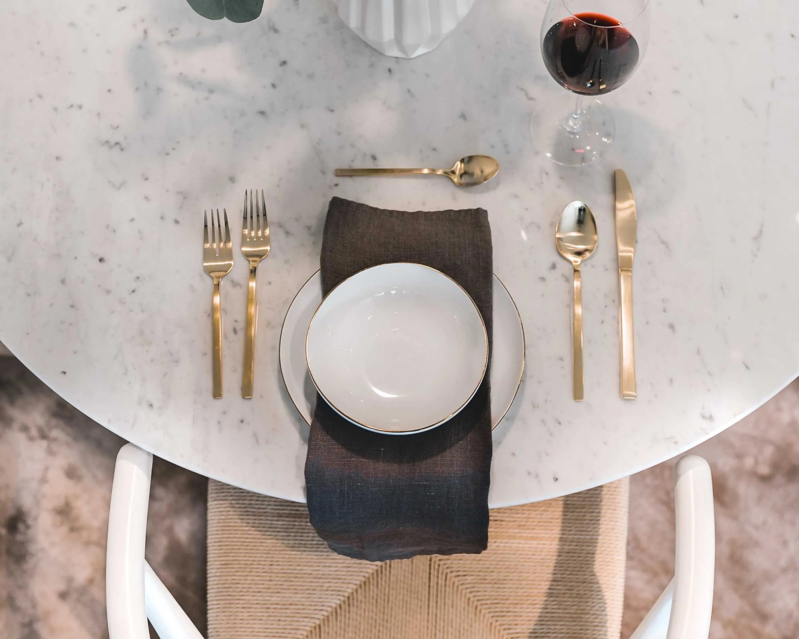 Sculptural Tulip Table with sleek pedestal base in dining room