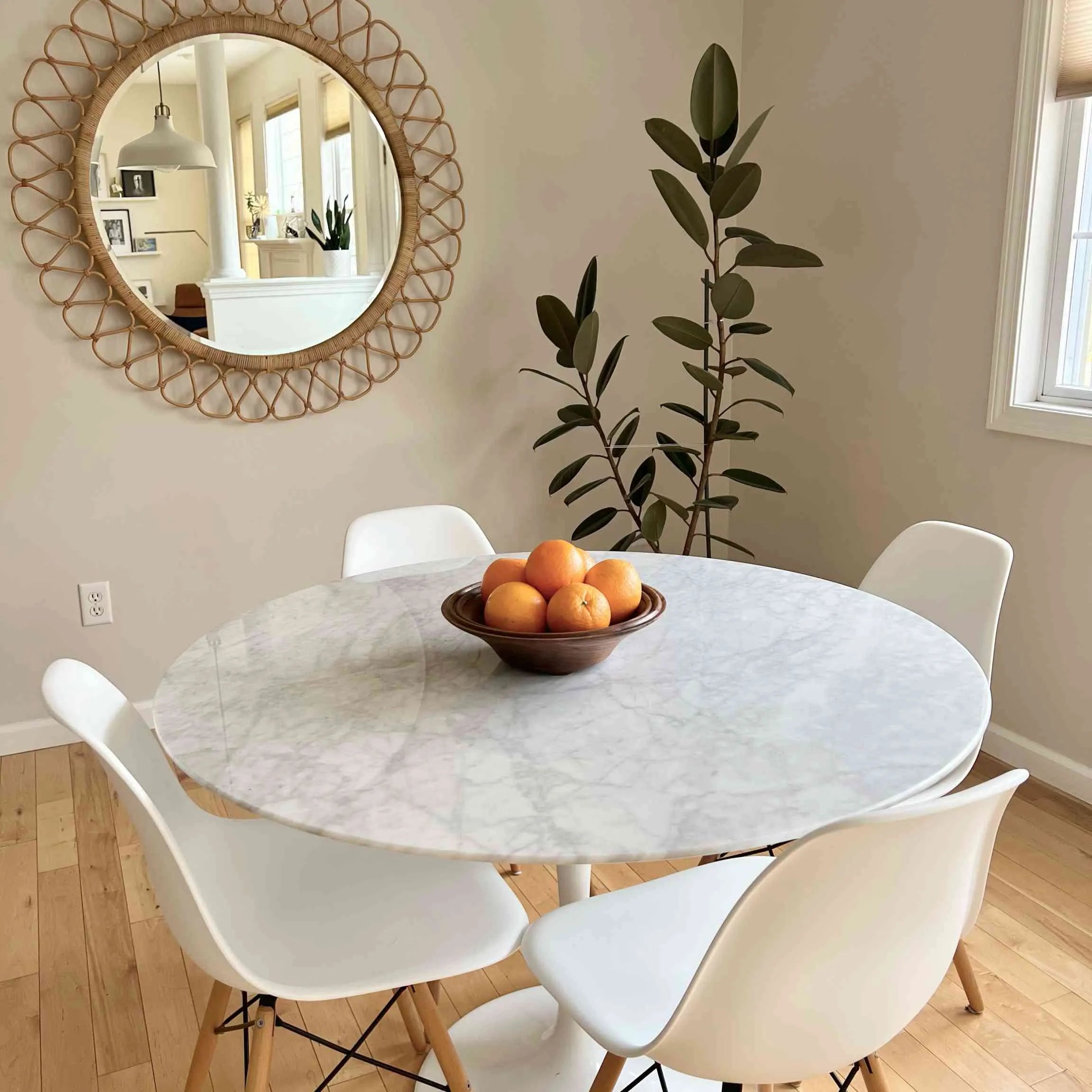 Smooth, curved lines of the Tulip Table enhancing living space