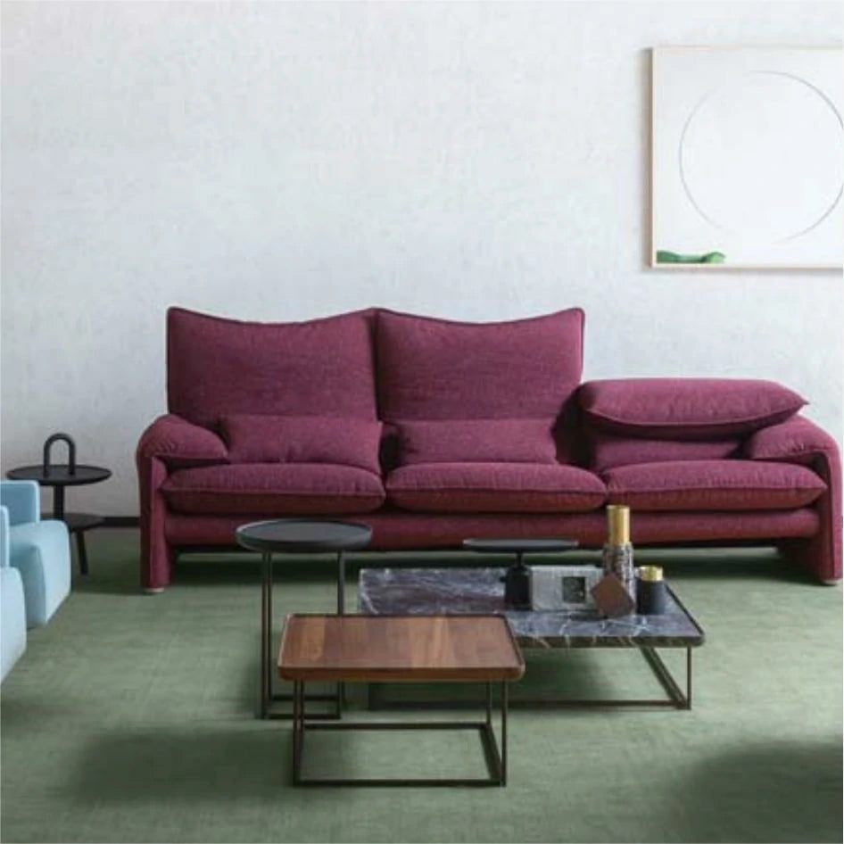 Side view of the Maralunga Sofa’s boxy 1970s shape