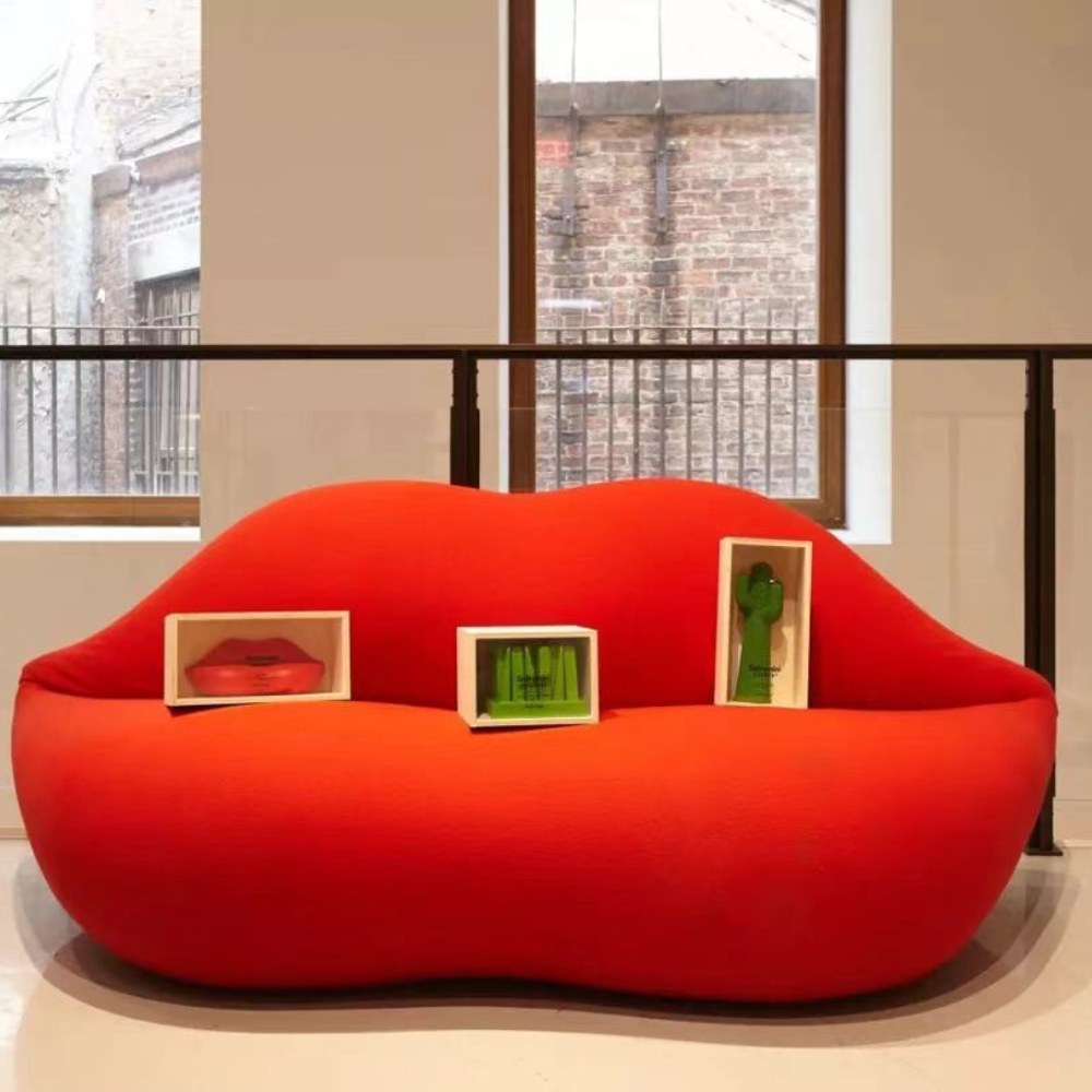 Chic lipstick sofa in vibrant red, a centerpiece that promises avant-garde elegance.