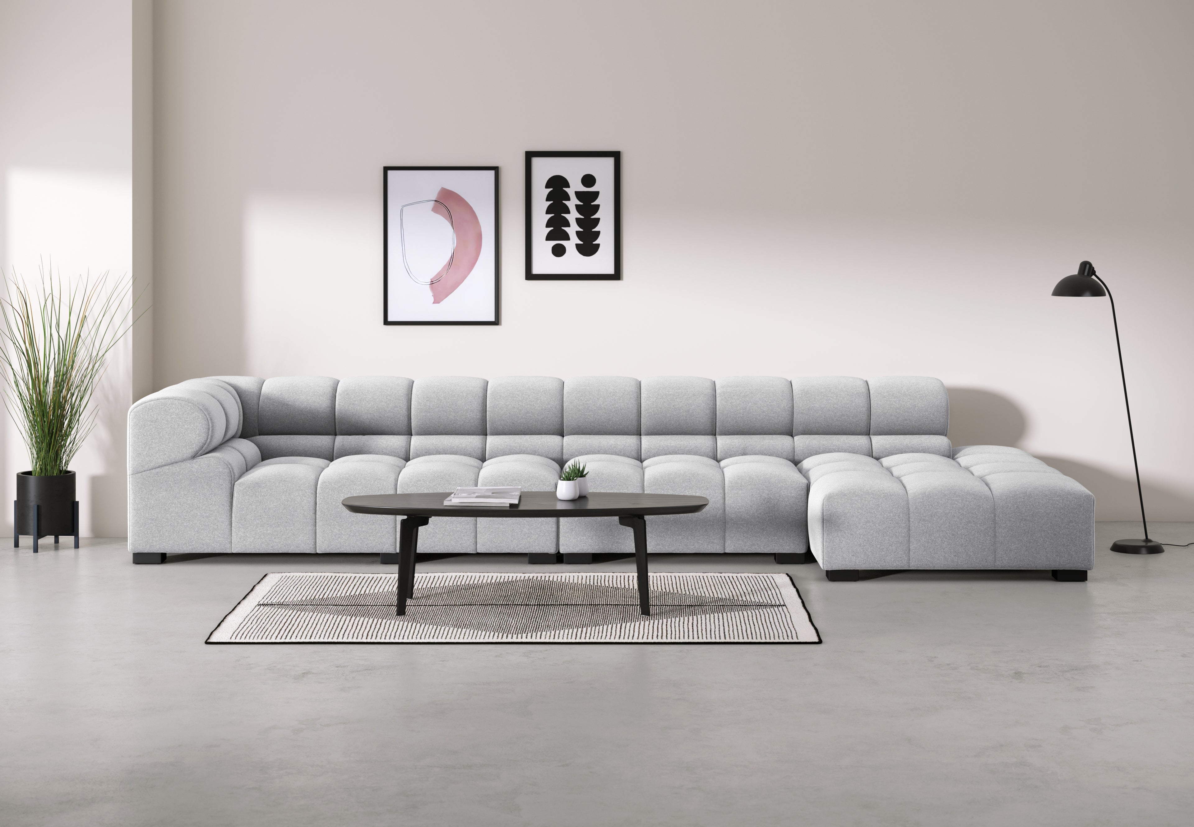 Luxury light gray wool sectional sofa with chaise, perfect for contemporary living rooms and cozy spaces.